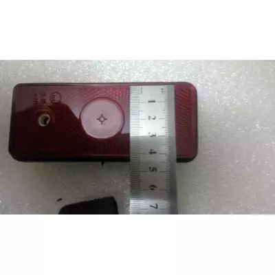 Задній габаритний вогонь (ліхтар) червоний зі світлоповертачем